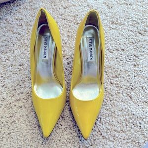 Patent leather yellow pumps
